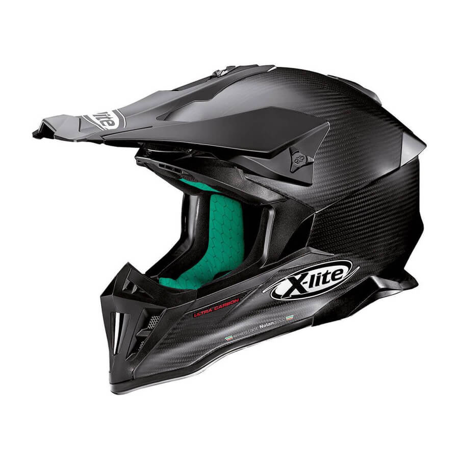 Racer wearing X-502 Ultra Carbon helmet, showcasing its sleek design and protection.
